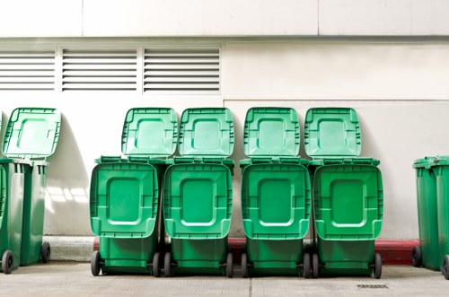Driver checking vehicle for safety before rubbish collection